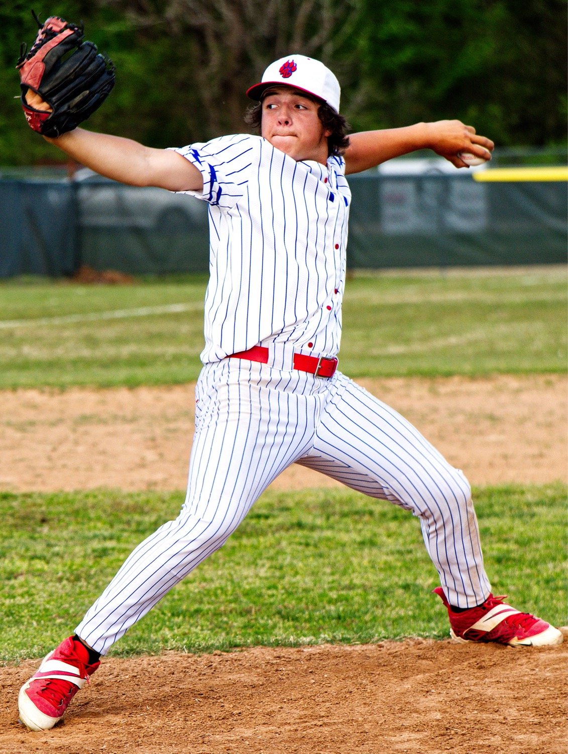 Chaelton Cook delivers a pitch in his winning effort against North Hopkins. [see more hits]